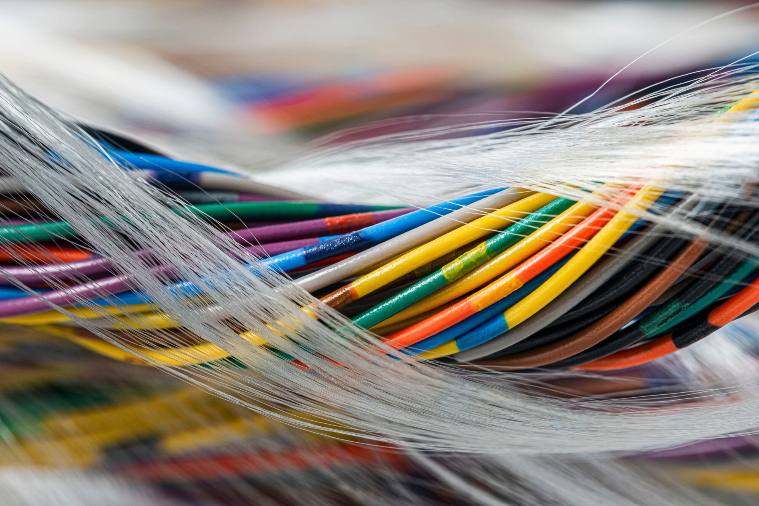 Illustrative photo of fibre-optic cables, representing ultra-high-capacity connectivity 